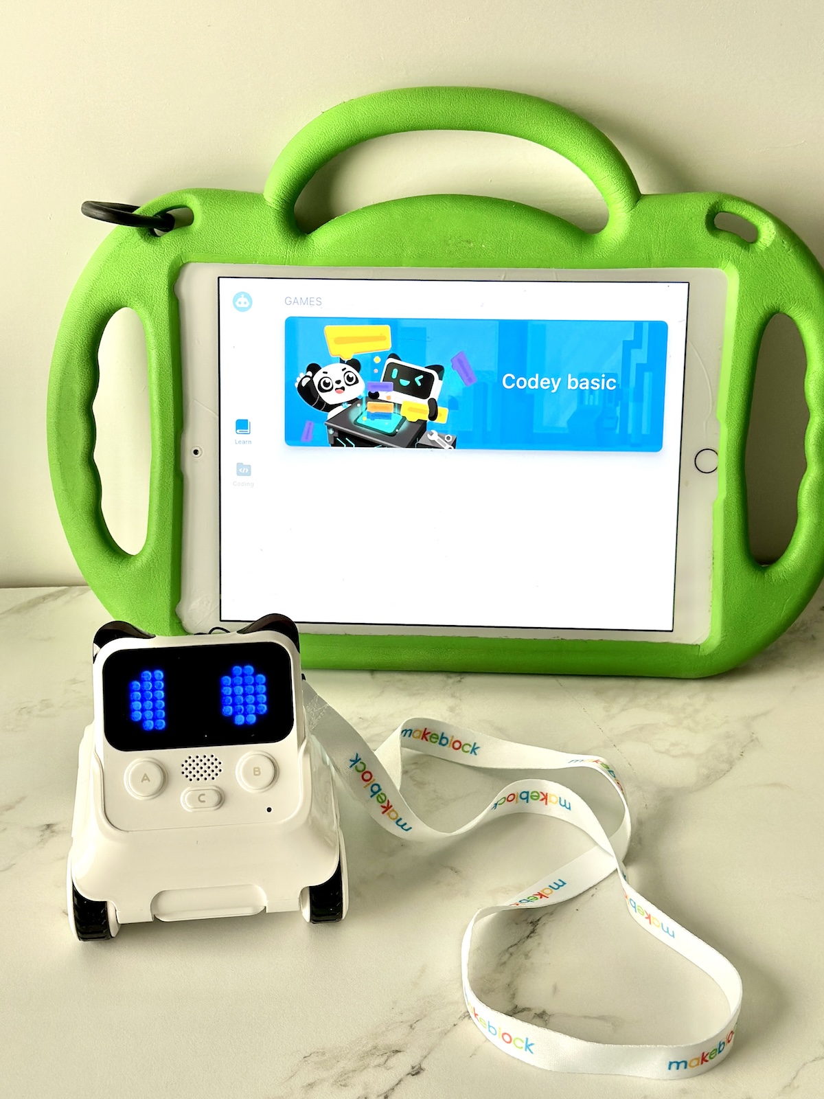The interactive Codey rocky robot toy and the Makeblock app.